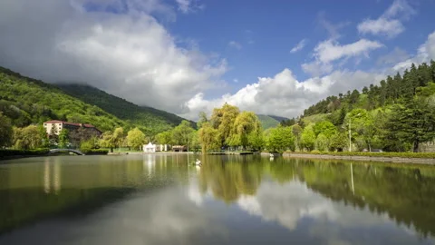 Clouds formation moving above the artificial city lake of Dilijan Stock Footage 190002076