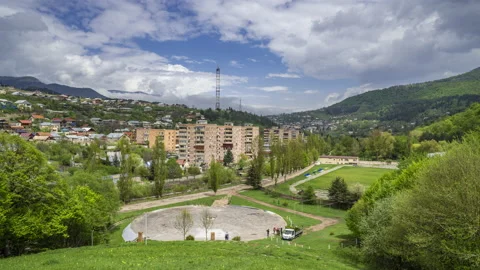 Clouds formation moving across the sky over the city of Dilijan Vídeos de archivo 190000925