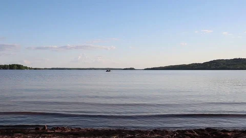 Clouds forming above a lake timelapse 库存影片 89971360