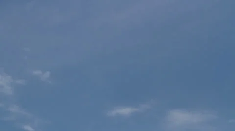 Clouds forming and dissolving in blue summer sky HD Stock Footage 39729968