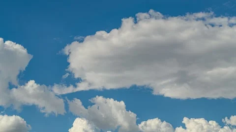 Clouds forming on blue sky time lapse Stock Footage 247012425