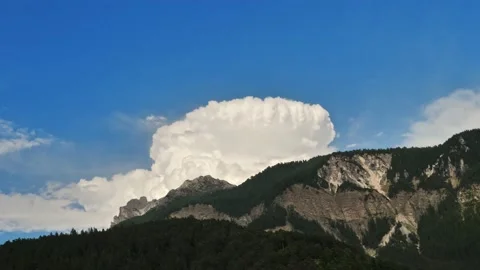 Clouds forming on top of the Mountain Stock Footage 156138067
