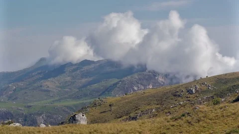 Clouds gather at the peak of a mountain in Malawi Stock Footage 74421068