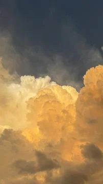 Clouds gather in the sky during the early evening showcasing different shad.. Stock Photos