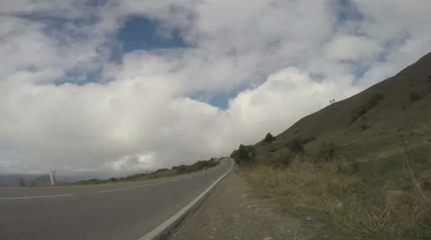 Clouds gathering over highway timelapse Stock Footage 52855900