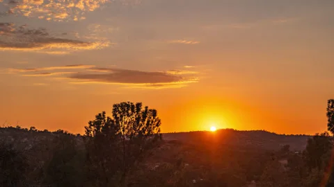 Clouds Gently Waft Across Subtle Sunset Timelapse Stock Footage 280213856