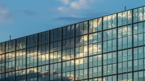 Clouds on glass Facade - modern architecture in Hamburg  - DSLR Timelapse Stock Footage 42916561
