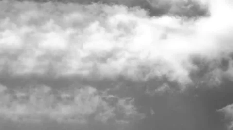 Clouds that go around and flow with the wind in black and white, old style Video stock 52989058