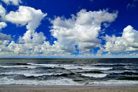 Clouds go over the sea Stock Photos