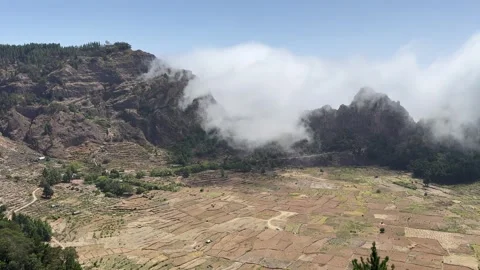 Clouds going in Cova vulcano crater mountain Cape Verde Antao Stock Footage 320466159