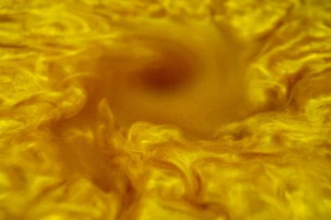 Clouds of golden dust making a vortex 01 Foto stock