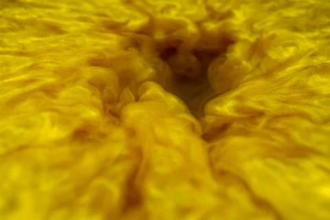Clouds of golden dust making a vortex 03 Foto stock