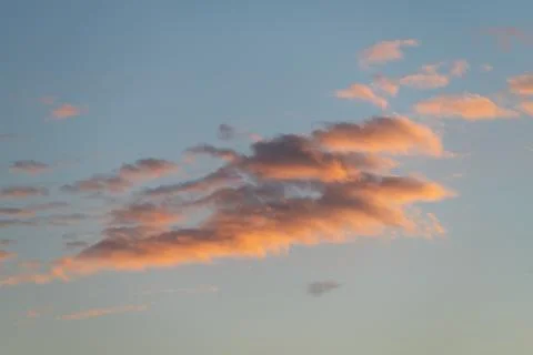 Clouds with a golden glow, perfect for dramatic scenes Stock Photos