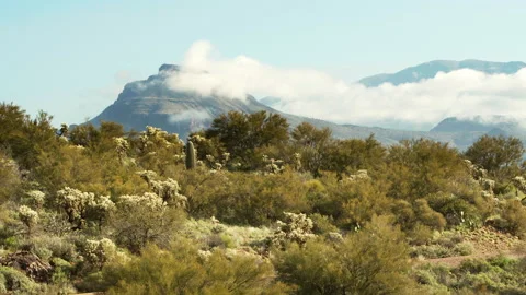 Clouds hanging around the mountains at Tonto National Forest, beautiful sunset l Stock Footage 213503653