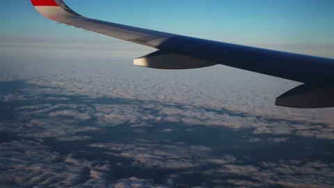 Clouds from a height of 10 kilometers. the plane makes flight maneuvers Video stock 163151168