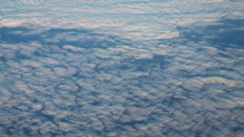 Clouds from a height of 10 kilometers. shooting from an airplane Stock Footage 163151075