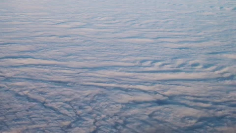 Clouds from a height of 10 kilometers. shooting from an airplane Stock-Footage 163151094