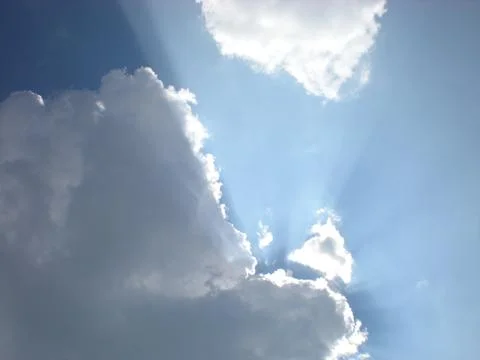 Clouds hide sunbeam Stock Photos
