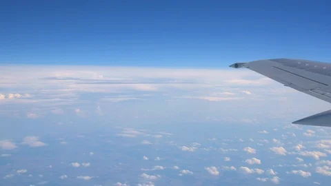 Clouds At High Altitude with Wingtip of Plane 動画素材 93992413