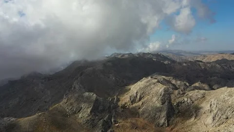 Clouds high in the mountains Aerial view Stock Footage 221203312