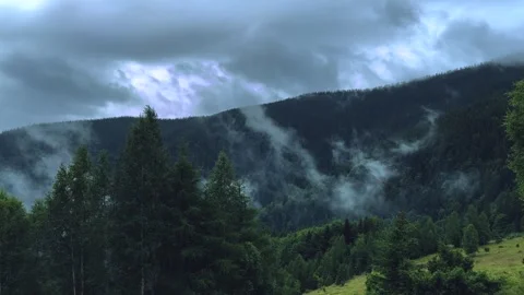 Clouds in the highlands. Vegetation in the mountains. Bad weather for mountain Stock Footage 251705054