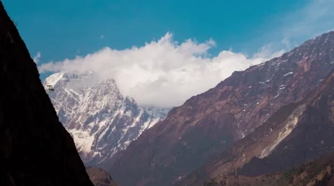 Clouds at the Himalayan mountain range as seen from Beni. Timelapse Stock Footage 67982005