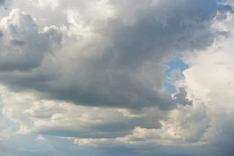 Clouds with a hole in the skylight Stock Photos