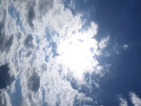 Clouds with the hot sun Stock Photos