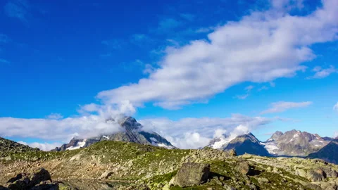 Clouds Hover Over the Mountains Stock Footage 148071121