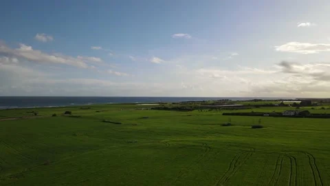 Clouds hung in the interim over the green fields. On the mediterranean sea. Stock Footage 236503829