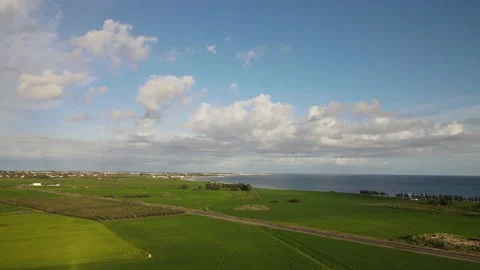Clouds hung in the interim over the green fields. On the mediterranean sea. Stock-Footage 236503927
