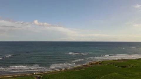Clouds hung in the interim over the green fields. On the mediterranean sea. Stock Footage 236503960