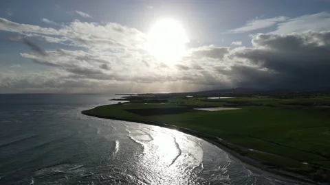 Clouds hung in the interim over the green fields. On the mediterranean sea. Stock Footage 236504162