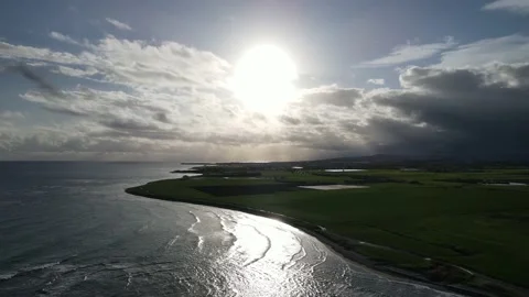 Clouds hung in the interim over the green fields. On the mediterranean sea. Stock Footage 236504181