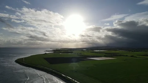 Clouds hung in the interim over the green fields. On the mediterranean sea. Stock Footage 236504213