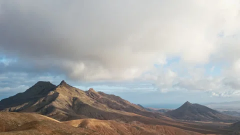 Clouds hyperlapse over desert landscape, Fuerteventura island Stock Footage 345715163