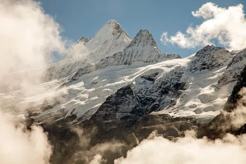 Clouds, ice and snow caps on Eiger,near Grindelwald, Switzerland Stock Photos