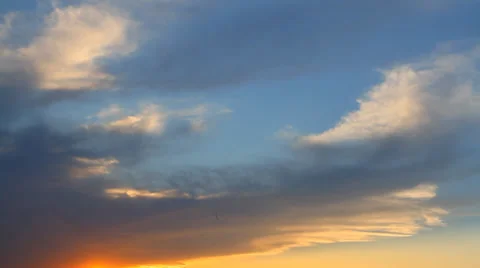 Clouds, illuminated by the setting sun Stock Footage 27331931
