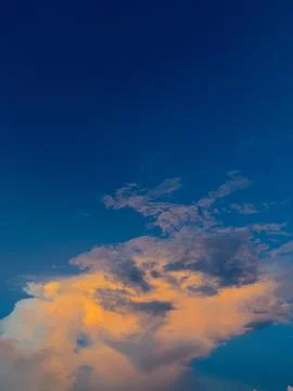 Clouds Illuminated by Sunset Sky Background Stock-Fotos