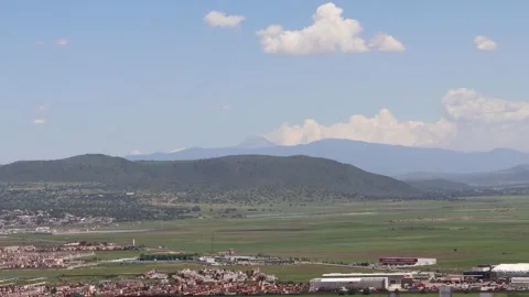 Clouds interacting with Volcano Stock Footage 314344909