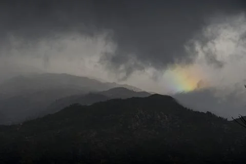 Clouds lifting up from the mountains 스톡 사진