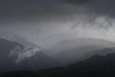 Clouds lifting up from the mountains Stock-Fotos