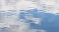 Clouds light metallic ripple water HD Footage