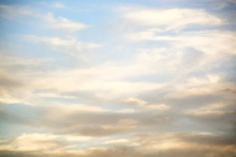 Clouds lit up in the sky at sunset.	4 Stock Photos