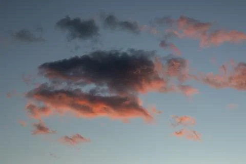 Clouds Lit By Sunset In Blue Sky Fotos de archivo