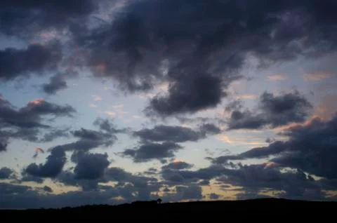 Clouds in many forms dawn to dusk taken all over the wrold Stock Photos