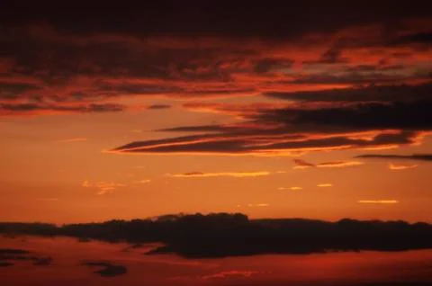 Clouds in many forms dawn to dusk taken all over the wrold Stock Photos