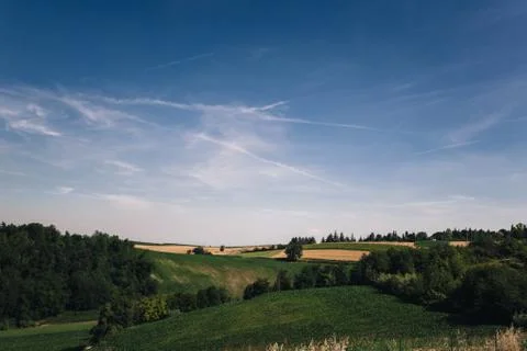 Clouds on the meadow Stock Photos