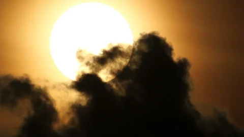 Clouds melting in sunlight Stock Footage 99823826