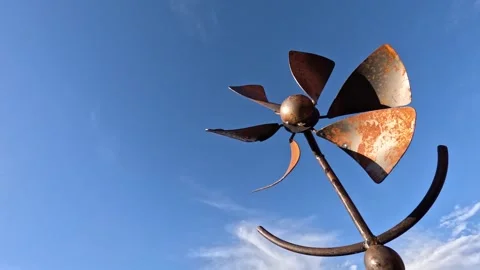 Clouds &amp; Metal Pinwheel Timelapse Stock Footage 255751297